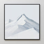 Alpine Ascent Abstract Canvas Art features a minimalist depiction of snow-covered mountain peaks in white and light gray with a sleek black frame, ideal for bringing a serene ambiance to your living room decor.