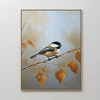 The Autumn Branch Canvas Art features a chickadee perched on an autumn branch with brown leaves against a soft blue and beige background, displayed on a plain light-colored wall.