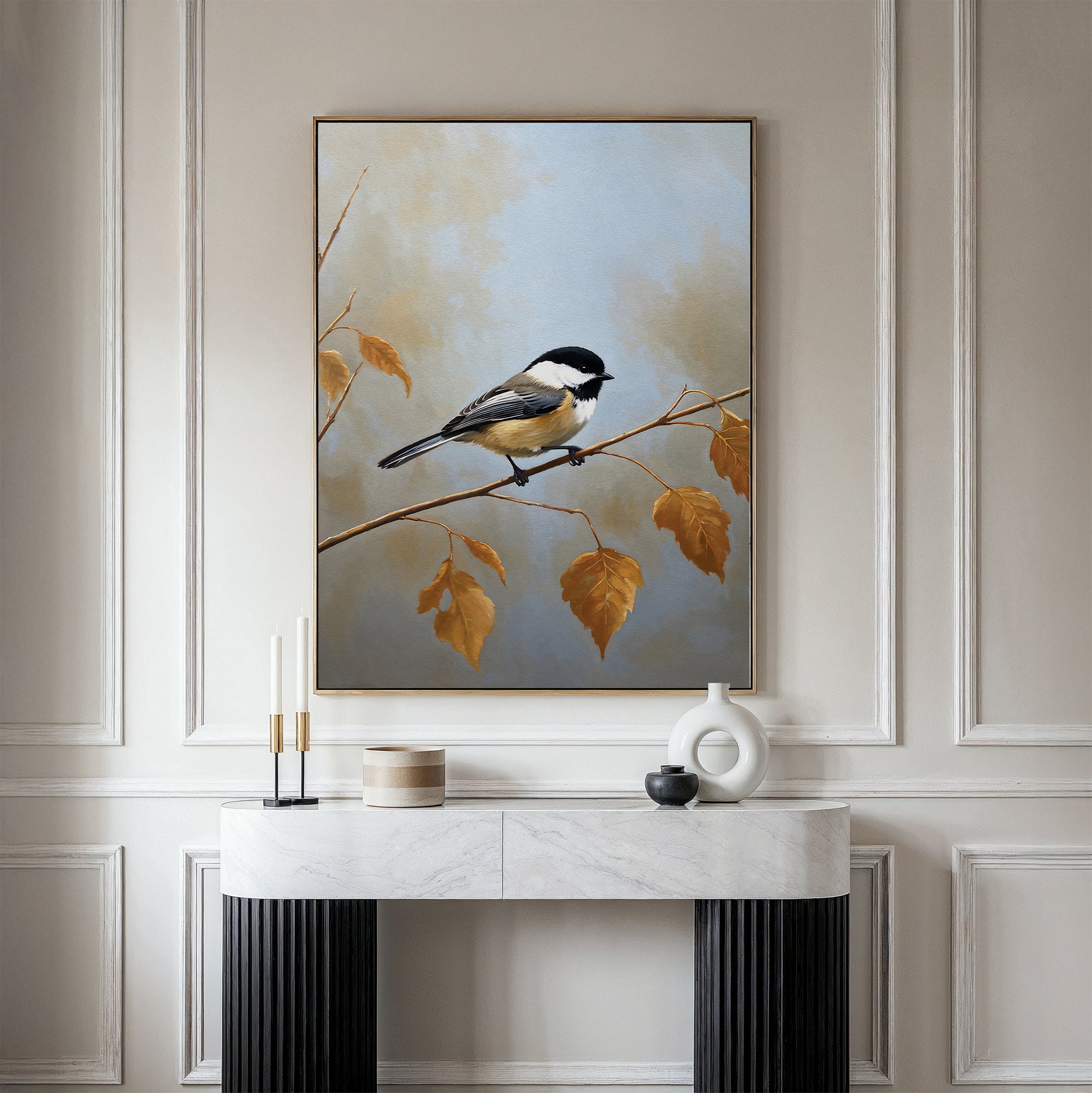A modern living space features a marble console table, decorative accents, and the Autumn Branch Canvas Art above — showcasing a chickadee on golden autumn leaves, adding Nordic Park elegance to the room.