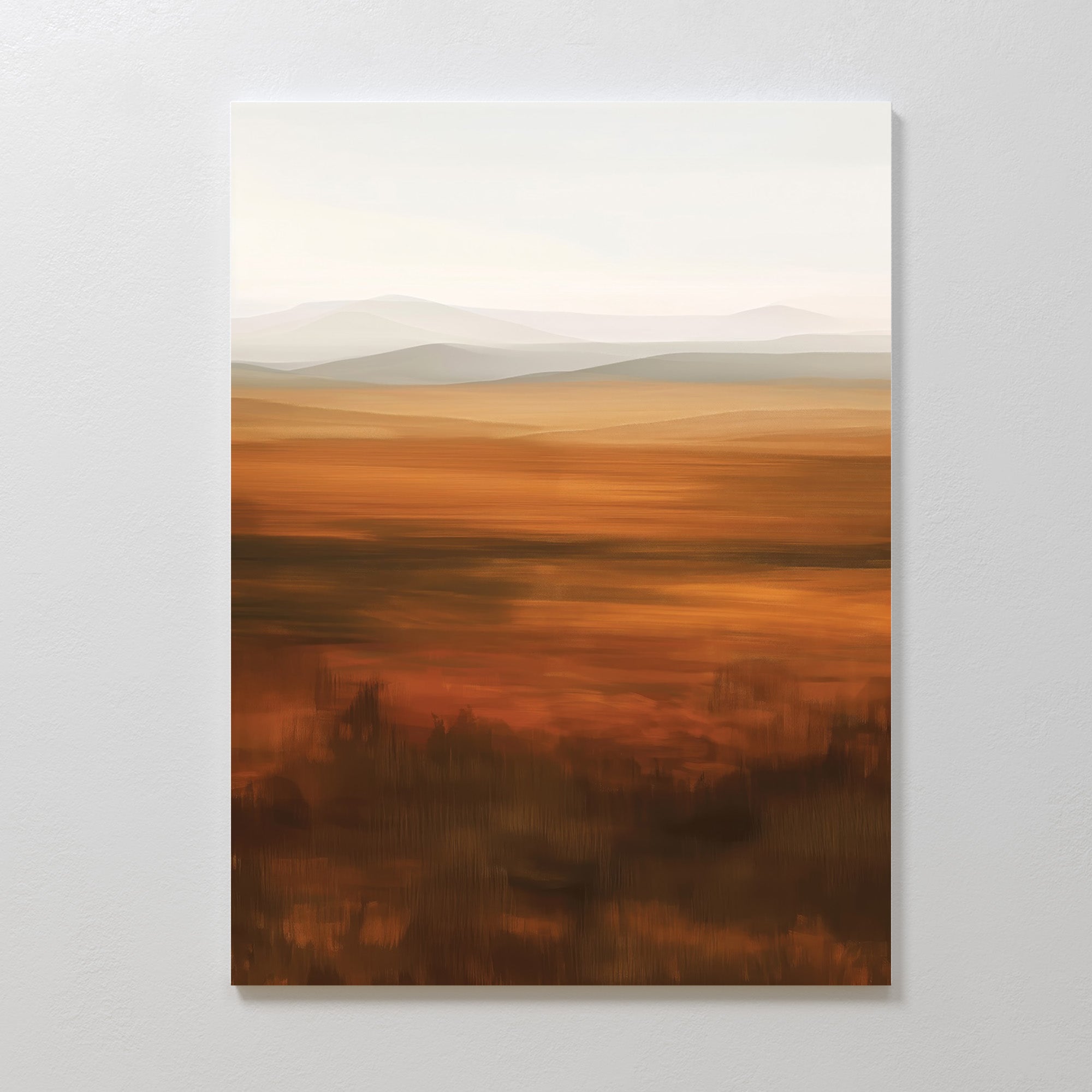 The Autumn Plains Abstract Canvas Art features a minimalist landscape with reddish-brown fields and hazy distant mountains, painted in soft brushstrokes. Warm, earthy tones capture the serene beauty of autumn.