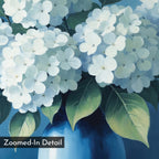 Close-up of Azure Cluster Canvas Art: white hydrangea flowers and green leaves in a blue vase on a blue background. This floral wall art print, titled "Zoomed-In Detail," appears in the lower left corner. Perfect for adding botanical elegance.