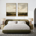 A modern bedroom with an olive green bed, white bedding, two beige nightstands with matching lamps, and the Beneath The Clouds Set of 2 landscape canvas art hanging above the bed on a white wall.