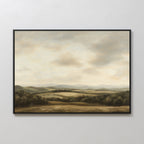 Beneath The Clouds Canvas Art is a minimalist wall piece featuring rolling hills, distant mountains, and fields beneath a cloudy sky, rendered in soft muted colors.
