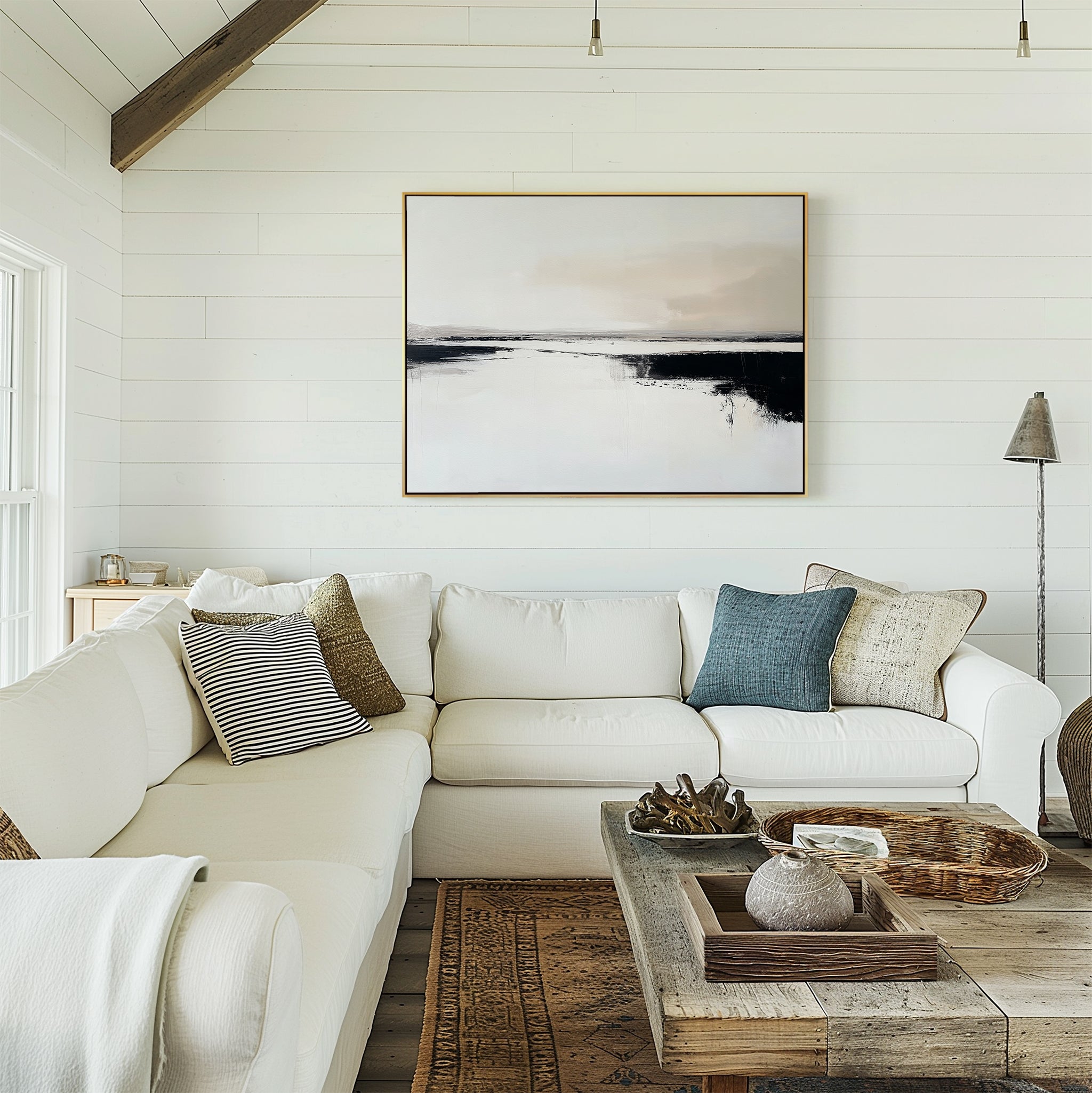 A cozy living room with a white sectional, assorted throw pillows, a rustic wooden coffee table, and Binary Calm Abstract Canvas Art – Horizontal on a white shiplap wall. Natural light fills the space for a relaxing vibe.