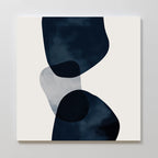 Blue Currents Canvas Art showcases three overlapping, irregular shapes in dark navy and translucent gray on a white background, creating a modern and minimalist look for your space.