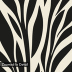 A close-up of Black Palm Study Canvas Art showcases bold, curved black and white lines—a striking minimalist piece for modern interiors. “Zoomed-In Detail” appears in the bottom left corner on a dark rectangle.