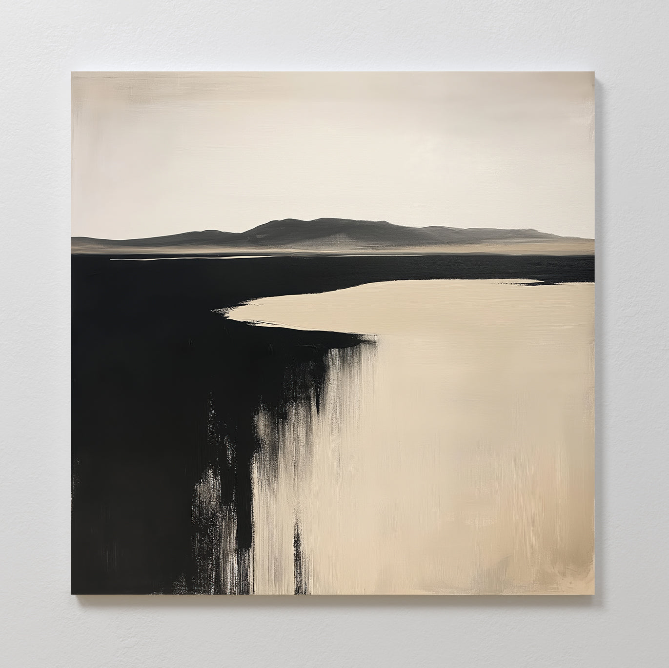 Black Shore Canvas Art features an abstract landscape in soft beige and black tones with distant mountains and reflective water, created with broad, textured brushstrokes—ideal for minimalist or modern living room decor.