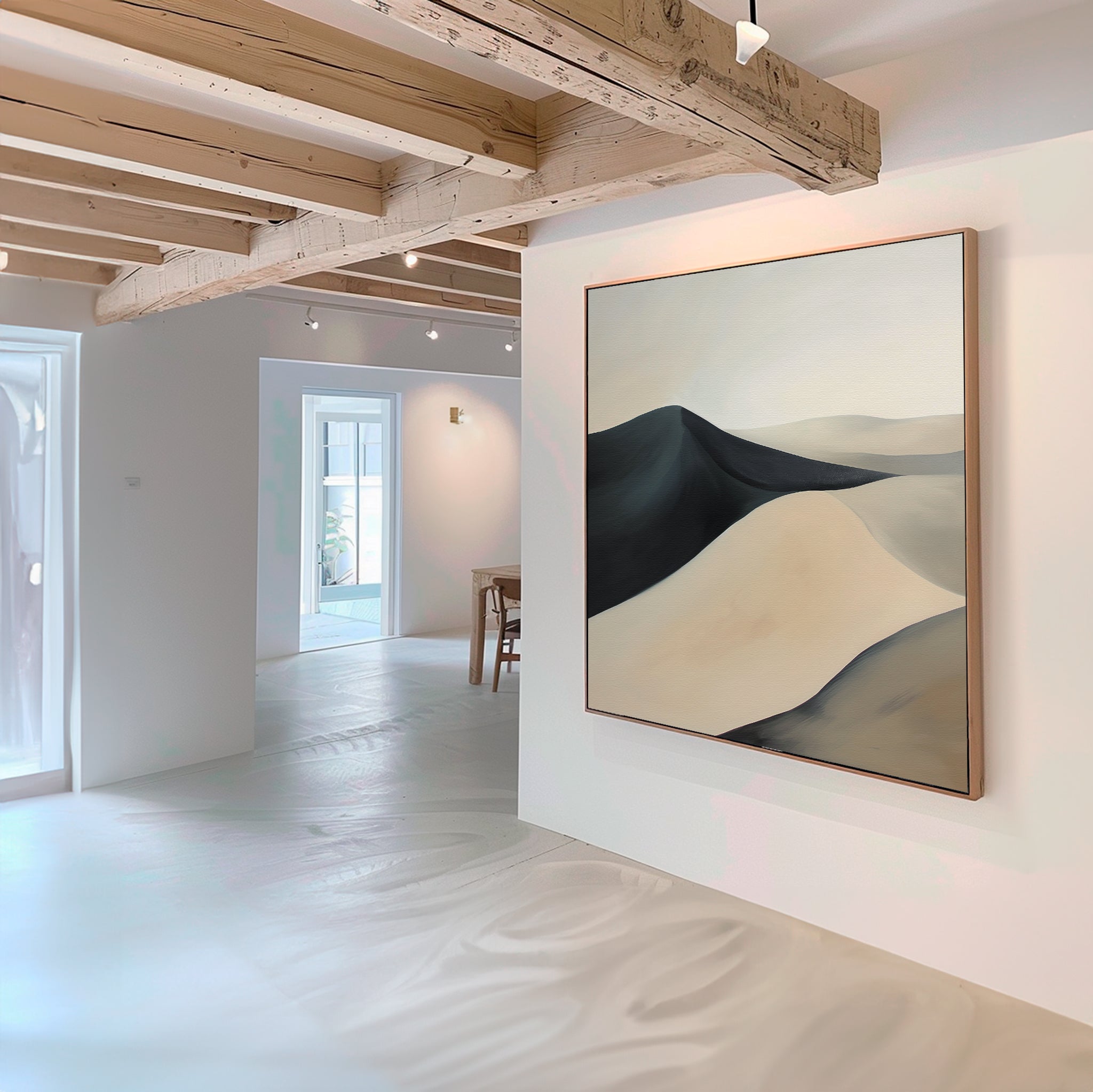 A minimalist living room with white walls and exposed wooden beams features the Black Veil Abstract Canvas Art in neutral tones. Natural light fills the space, enhancing the modern decor.