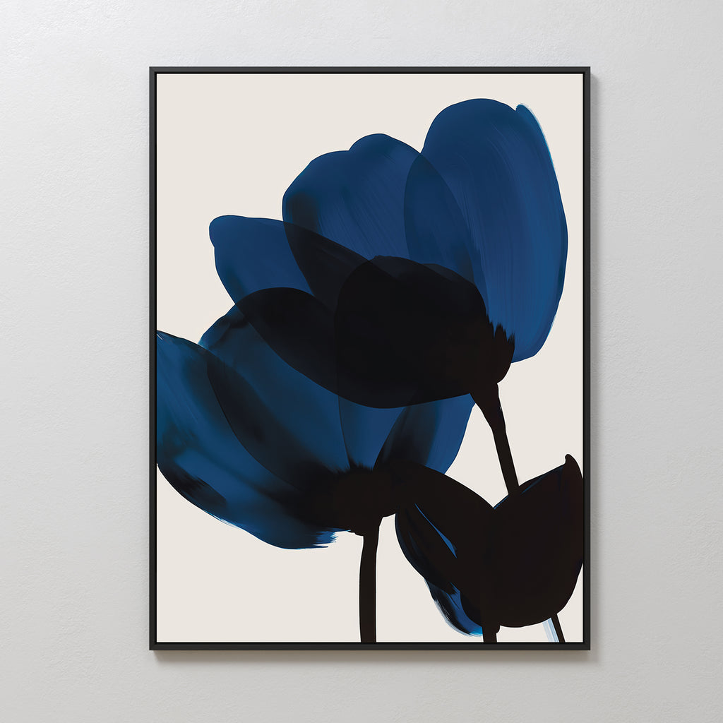 Bloom Abstract Canvas Art showcases two abstract blue flowers with dark stems on an off-white background, framed in a slim black frame—an elegant piece for modern living room decor.