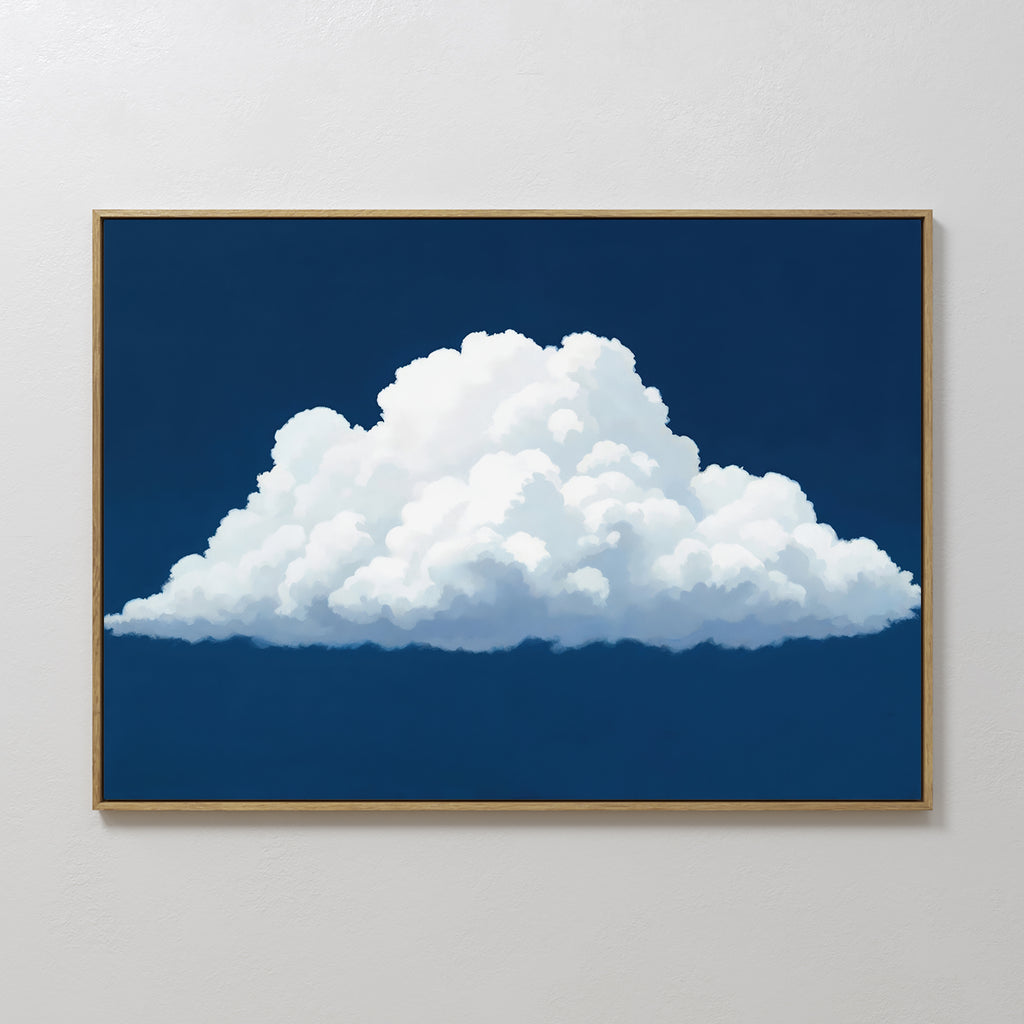 The Blue Horizon Cloud Canvas Art showcases a fluffy white cloud on a deep blue sky, framed and displayed on a white wall—ideal minimalist decor for modern living rooms.