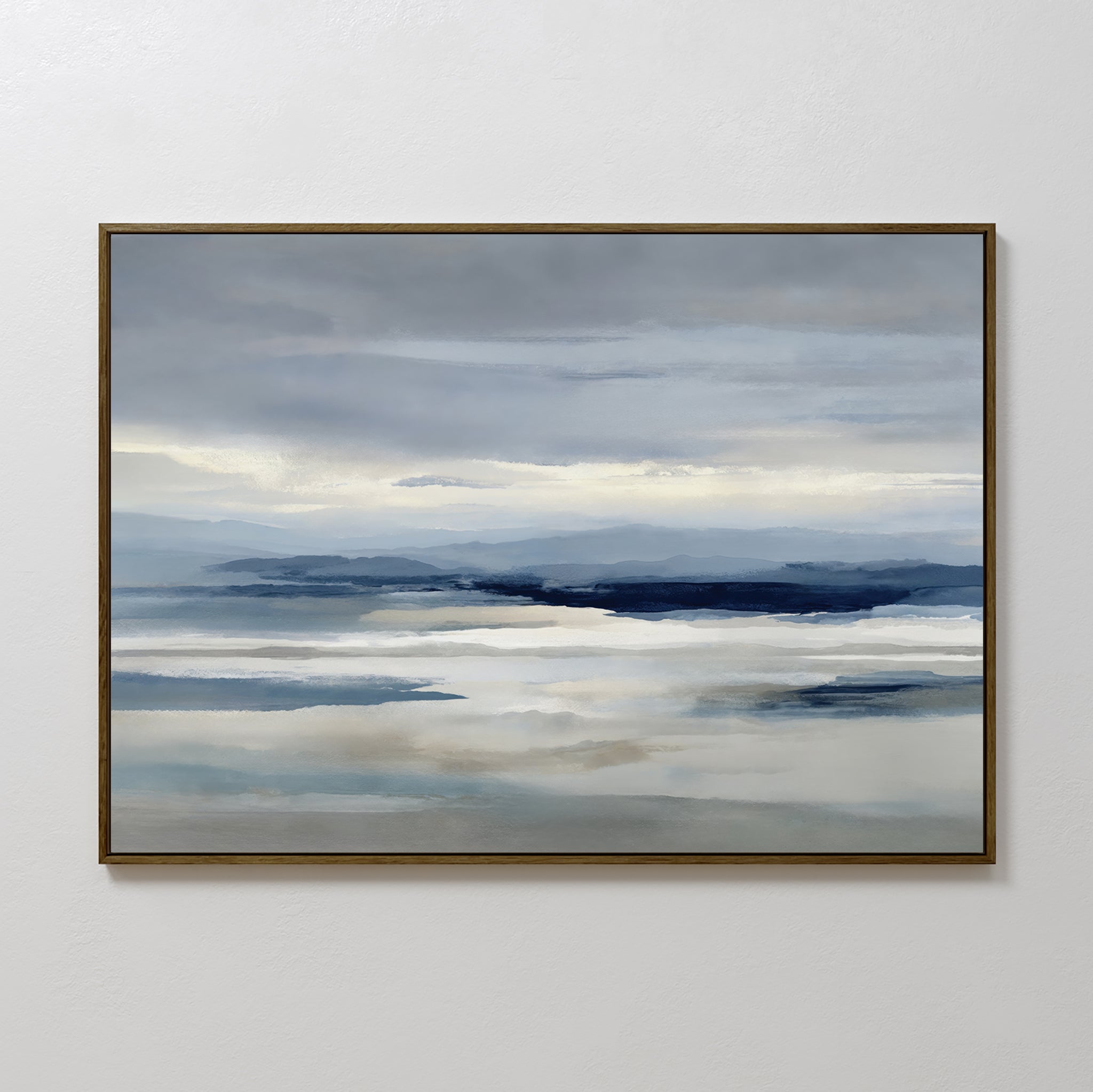 The Blue Mist Horizon Canvas Art features minimalist blue, gray, and white tones in a serene landscape of calm water and distant mountains, creating a tranquil atmosphere perfect for living room decor.