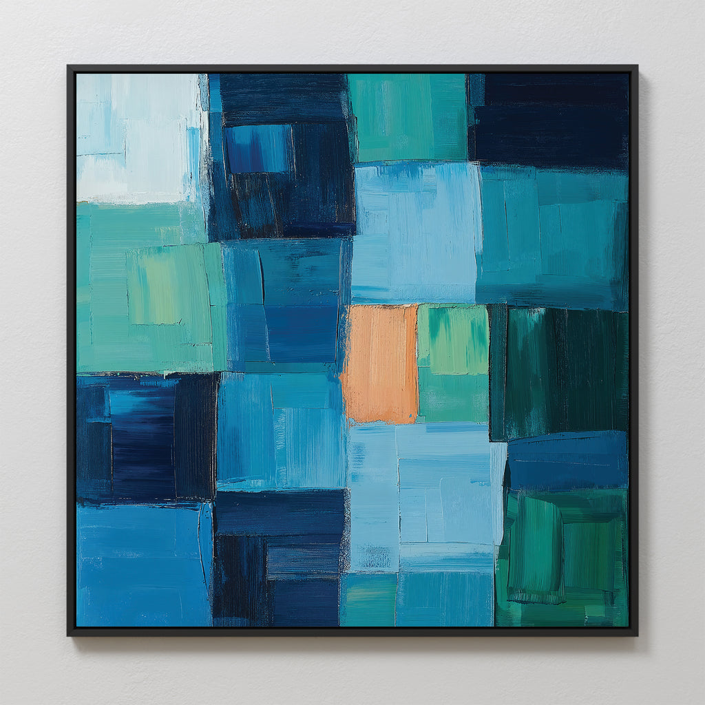 The Blue Mosaic Abstract Canvas Art features a framed geometric design with blue, teal, and green rectangular blocks and a bold orange accent. Textured brushstrokes create a modern piece ideal for stylish living room décor.