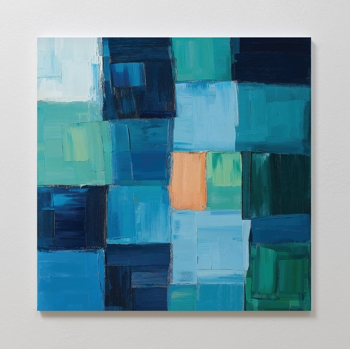 Blue Mosaic Abstract Canvas Art features overlapping rectangular blocks in blue, teal, green, and a central orange accent—an eye-catching piece for striking living room decor.