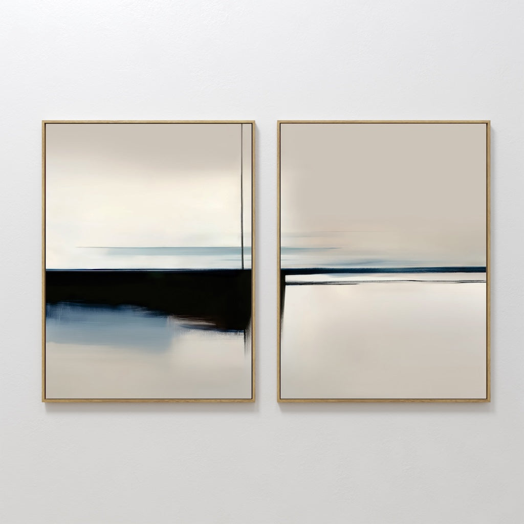 The Blurred Reflections Set of 2 features minimalist abstract paintings in beige, black, blue, and white tones, each in a slim gold frame. This wall art brings a serene, modern touch to any room.