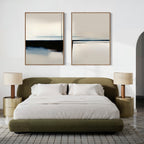 Modern bedroom with an olive green bed, white bedding, matching nightstands with beige lamps, a patterned rug, and the Blurred Reflections Set of 2 minimalist wall art above the bed.
