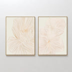 The Blush Sketch Set of 2 features framed minimalist line drawings of large, delicate flowers in soft beige, displayed side by side for elegant wall art that enhances modern bedroom decor.