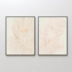 The Blush Sketch Set of 2 features framed minimalist line drawings of large beige flowers with overlapping petals—ideal modern wall art for a bedroom.