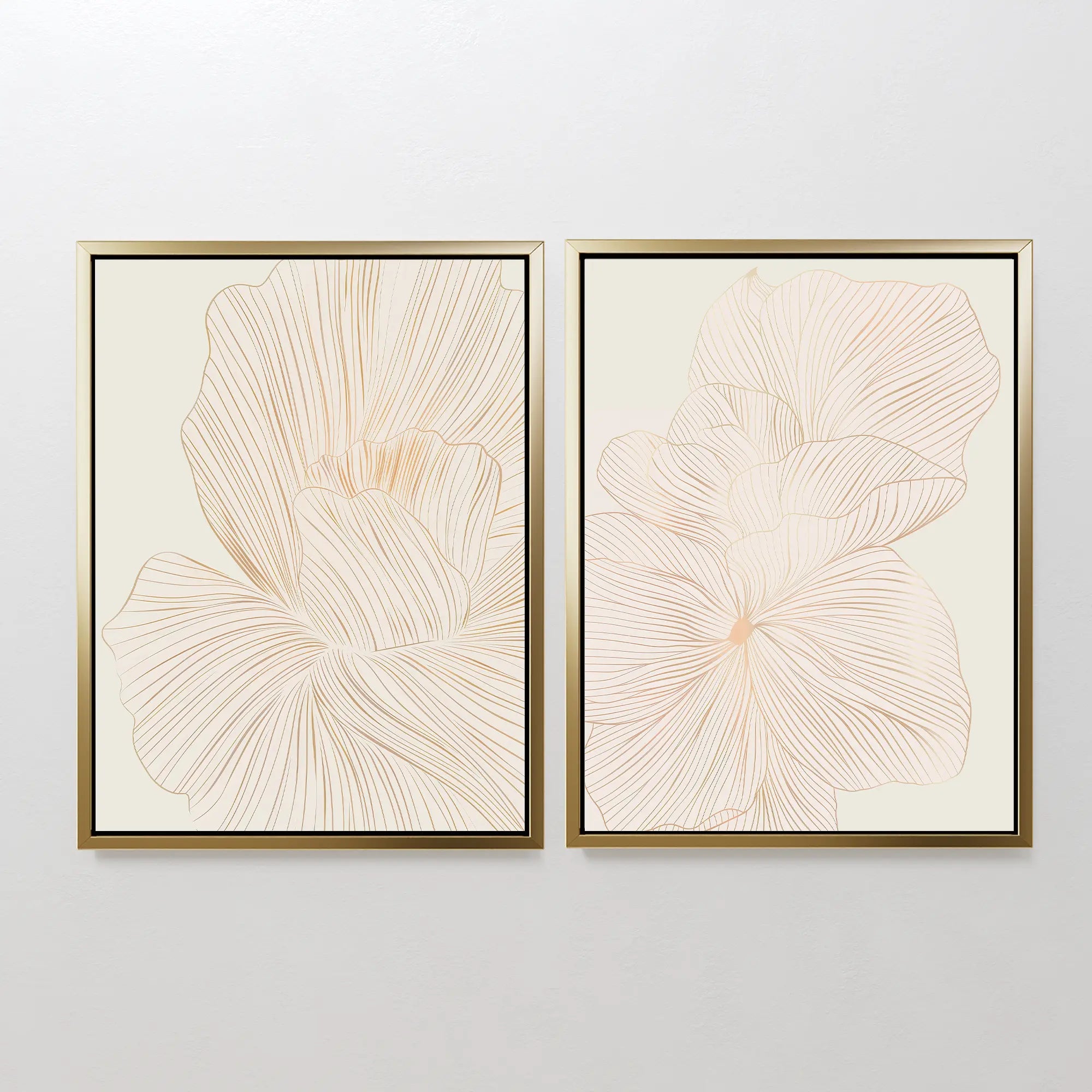 The Blush Sketch Set of 2 features framed abstract line drawings of large, overlapping floral shapes in soft beige tones, perfect minimalist wall art for modern bedroom decor.