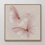 Blush Wings Canvas Art showcases two delicate, light pink butterflies with translucent wings on a soft pastel background—perfect blush pink wall decor for any space.