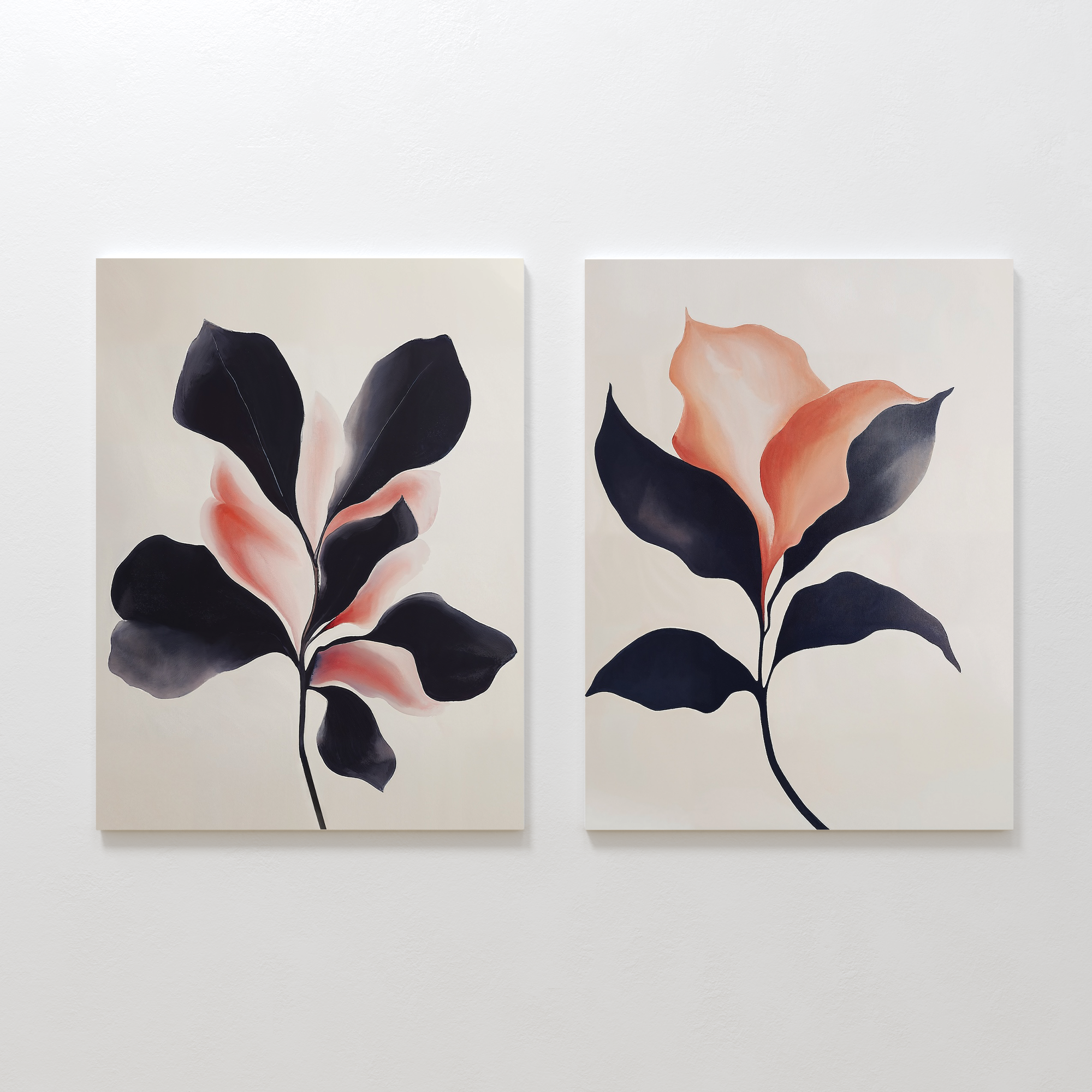 The Blush & Shadow Set of 2 features minimalist abstract leaf paintings in dark navy and soft coral pink, displayed side by side on a white wall.