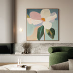 A modern living room featuring the Bold Bloom Canvas Art—an abstract floral painting—paired with a green curved armchair, marble shelf, dried flowers in a vase, and books with candles on a white table for elegant style.