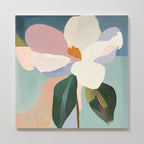 The Bold Bloom Canvas Art features a modern, abstract painting of a single flower with pastel petals, a yellow-orange center, and green leaves set against a soft, multicolored background.