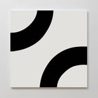 Bold Orbit Canvas Art showcases two thick black curved arcs on a white square canvas, each partially visible at opposite corners, creating a striking minimalist geometric design ideal for modern interiors.
