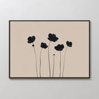 The Botanic Abstract Canvas Art displays six black floral silhouettes with long stems on a light beige background, set in a slim black frame, creating a modern minimalist wall art piece for your space.