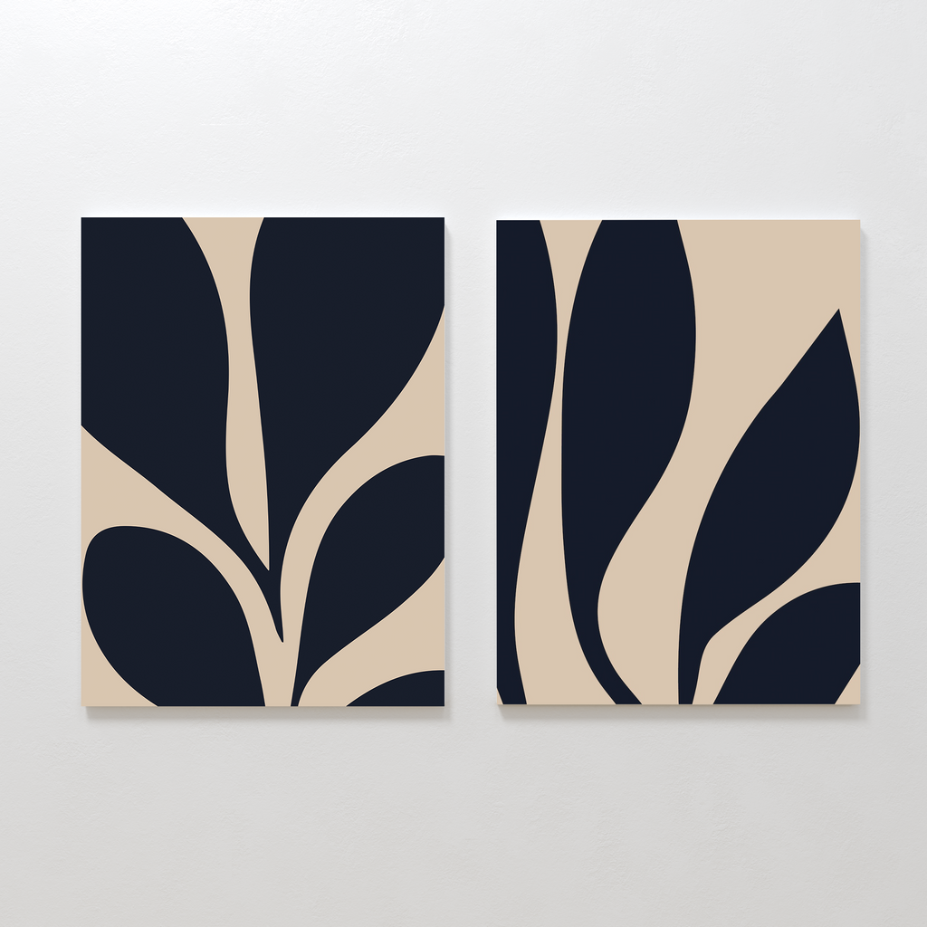 Botanical Ink Set of 2 features minimalist canvas paintings with abstract black leaf forms on beige, hung side by side to create modern wall art—ideal for adding an organic, cohesive touch to your living room decor.