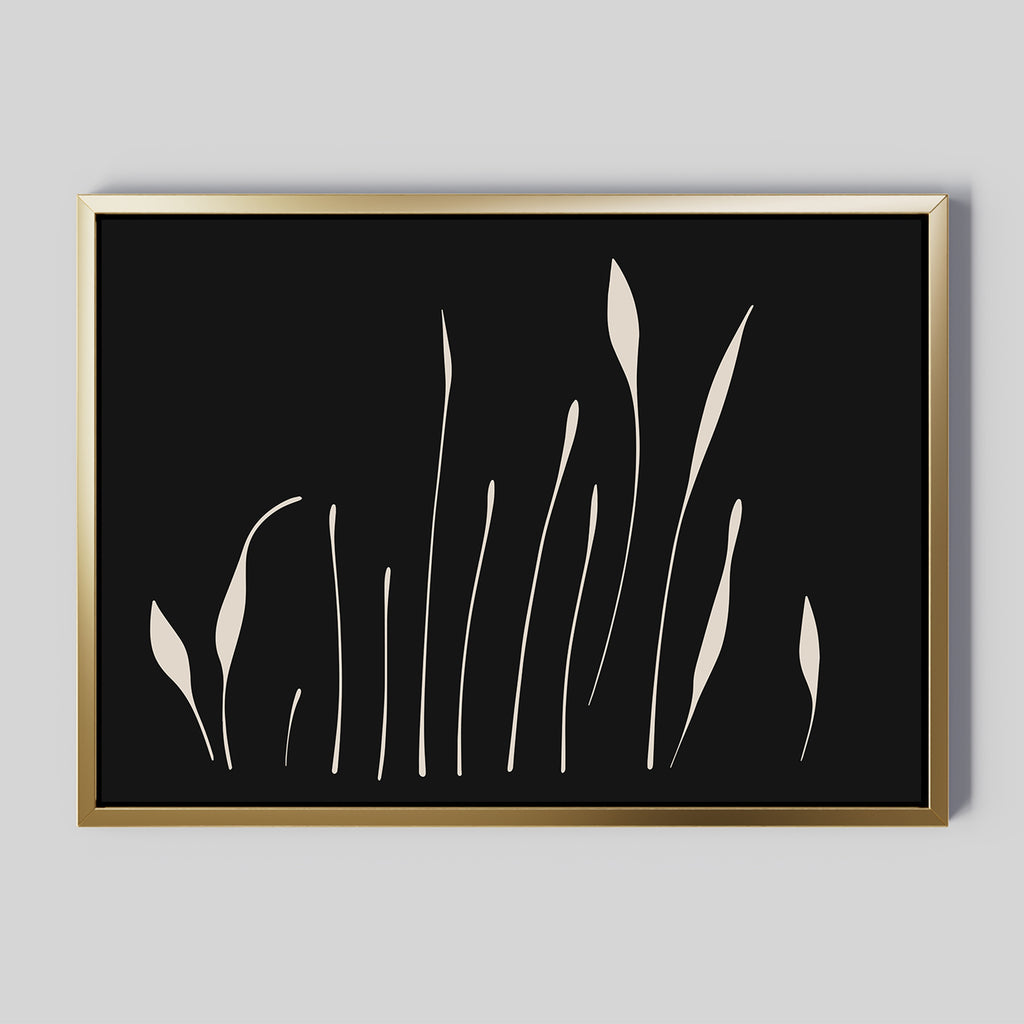 Botanical Silhouettes Abstract Canvas Art features cream floral silhouettes on black in a gold frame, ideal as minimalist wall art for light gray walls.
