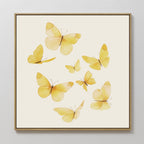 Butterfly Radiance Canvas Art showcases seven delicate yellow butterflies with translucent wings, artfully displayed on a plain off-white background, inspired by Nordic Park design.