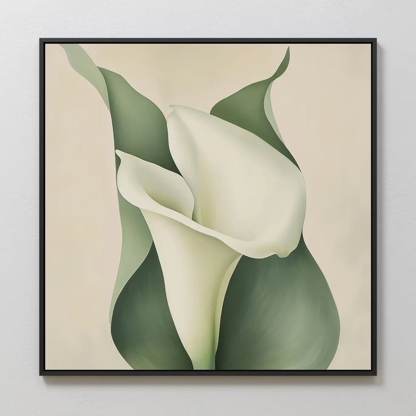 Calla Duo Canvas Art showcases two white calla lilies with green leaves on a light beige backdrop, softly blended and framed in sleek black—ideal for modern decor and creating a serene floral wall art display.