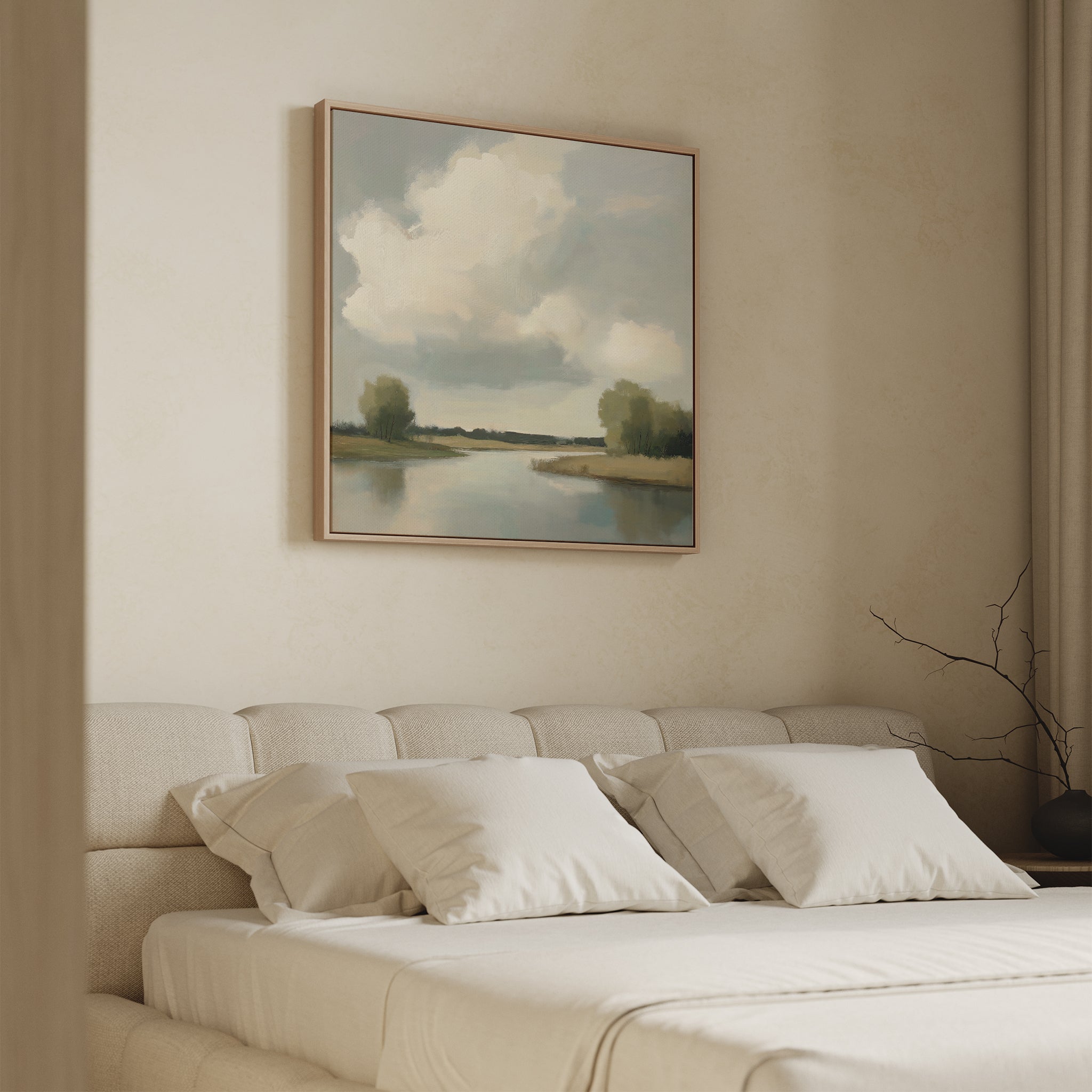 A serene bedroom features the Calm Passage Canvas Art—a large painting of a river and trees above a beige upholstered bed with white pillows. Soft lighting and neutral tones enhance the calm, inviting atmosphere.