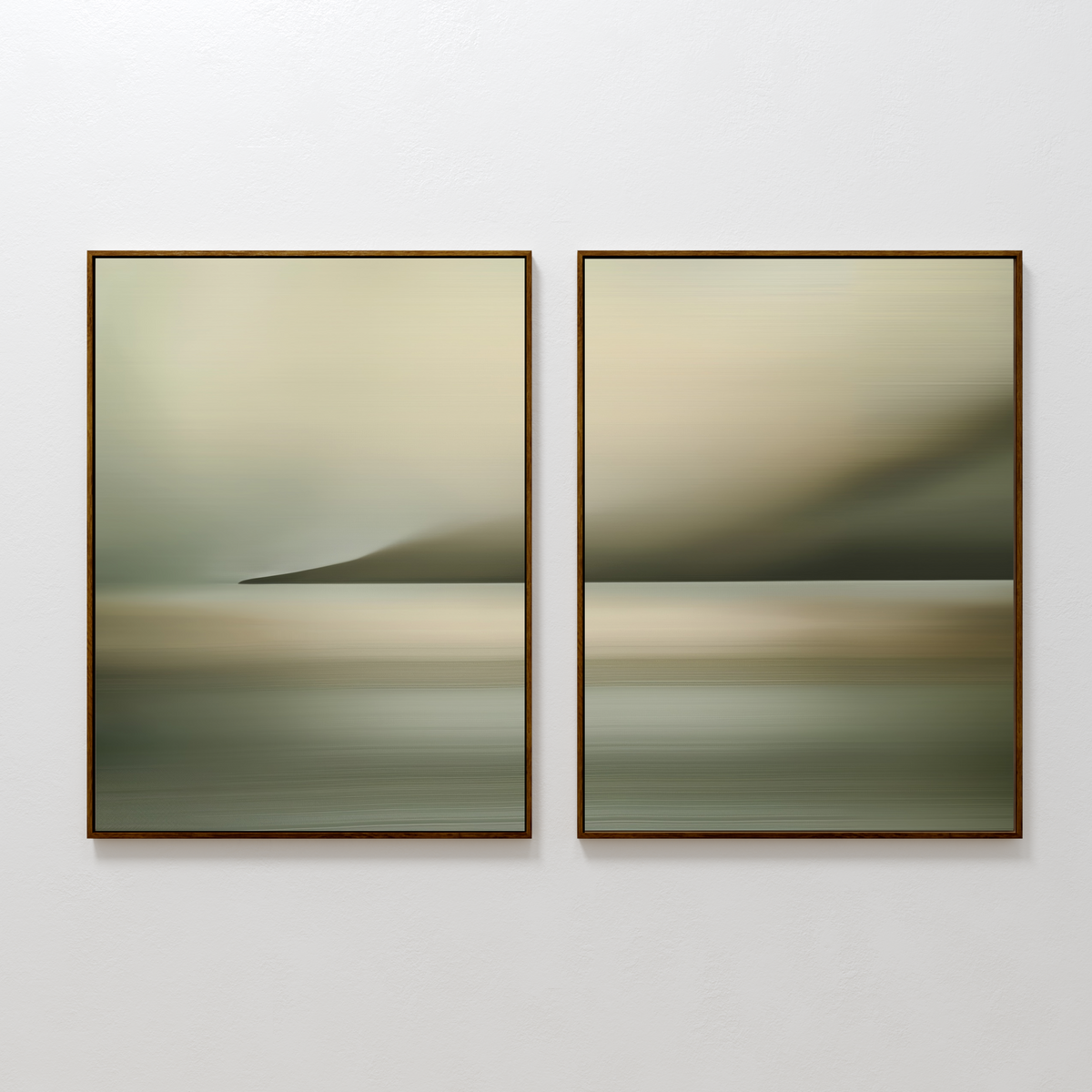 The Calm Waterscape Set of 2 features framed abstract landscape prints with soft, blurred earth tones and gentle gradients of green, beige, and gray, displayed side by side on a white wall.