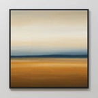 Caramel Plains Canvas Art showcases blended bands of warm golden brown with cool blue and soft gray, creating a tranquil abstract landscape. Perfect for modern bedroom decor, it comes framed in black and displayed on a white wall.