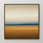 The Caramel Plains Canvas Art features horizontal bands of beige, blue, and golden brown for a serene landscape effect. Simply framed and ideal for modern bedroom decor, it looks stunning on a light-colored wall.