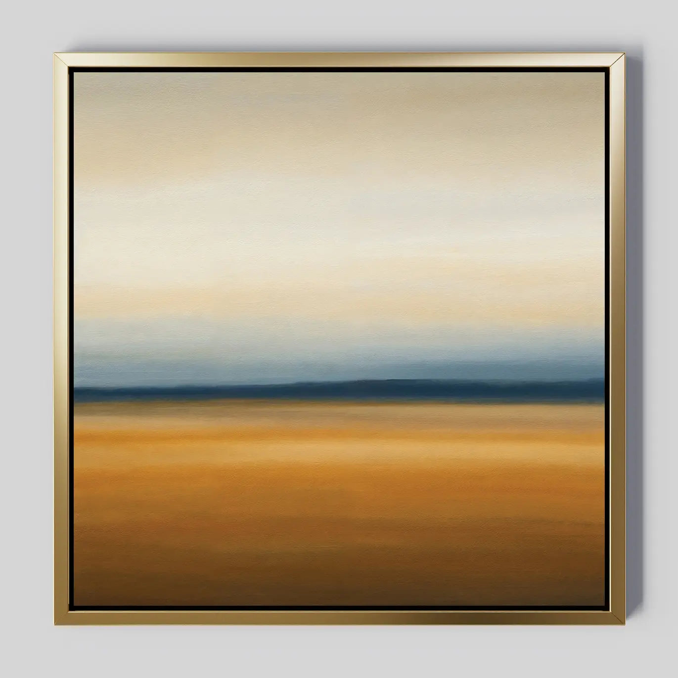The Caramel Plains Canvas Art is a framed abstract piece with horizontal bands of golden brown, deep blue, and soft beige—evoking a serene horizon and ideal for modern bedroom decor.
