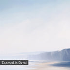 Cliffside Light Canvas Art – Horizontal depicts a pastel, misty coastline with distant cliffs and a sandy beach under a light blue sky. Minimalist wall art with “Zoomed-In Detail” label in the corner.