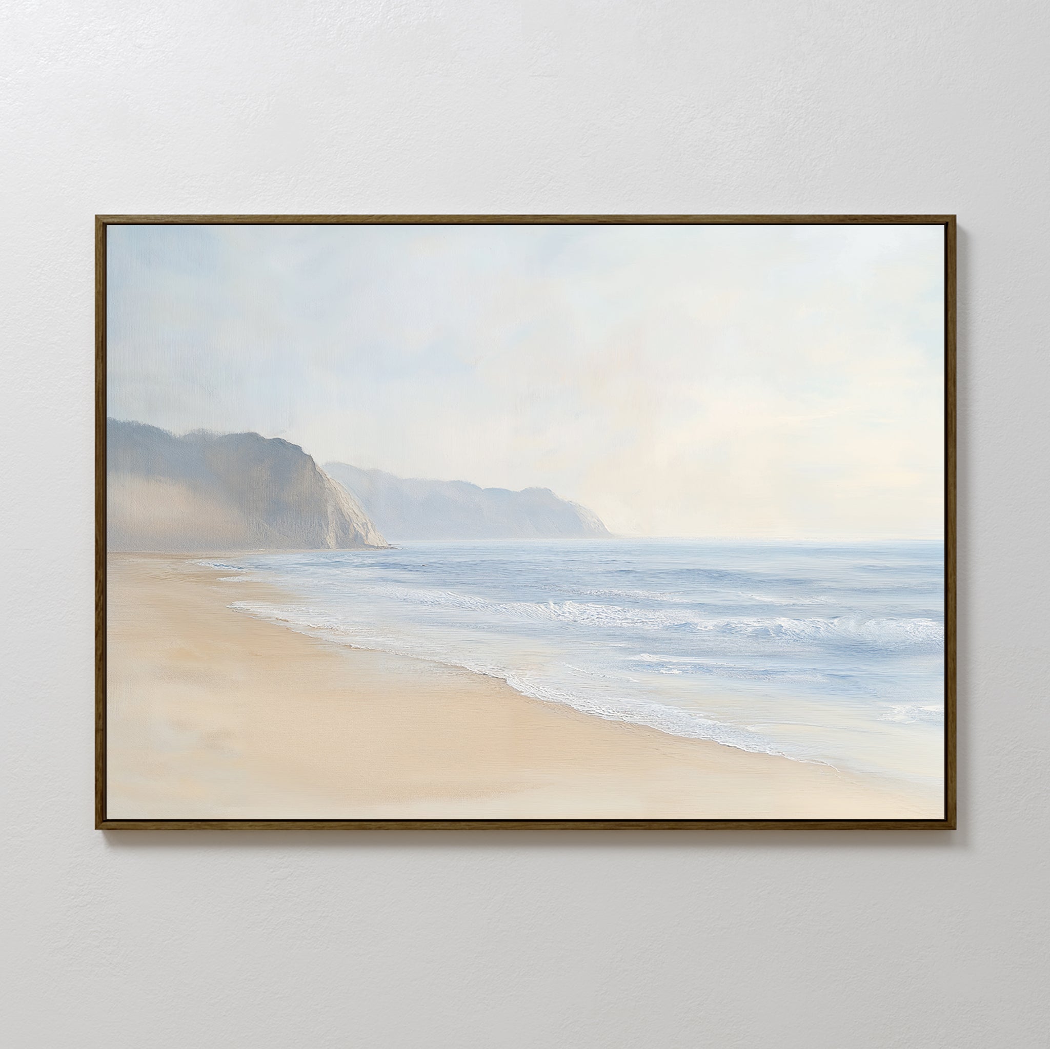 The Coastal Cliffs Canvas Art features a serene beach scene with soft waves and misty cliffs, bringing tranquility and a peaceful atmosphere to any modern home decor.