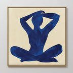 Cobalt Figure Canvas Art: A minimalist canvas with a blue silhouette of a seated figure, legs crossed and arms raised, set on a light beige background in a square frame—perfect for modern wall art enthusiasts.