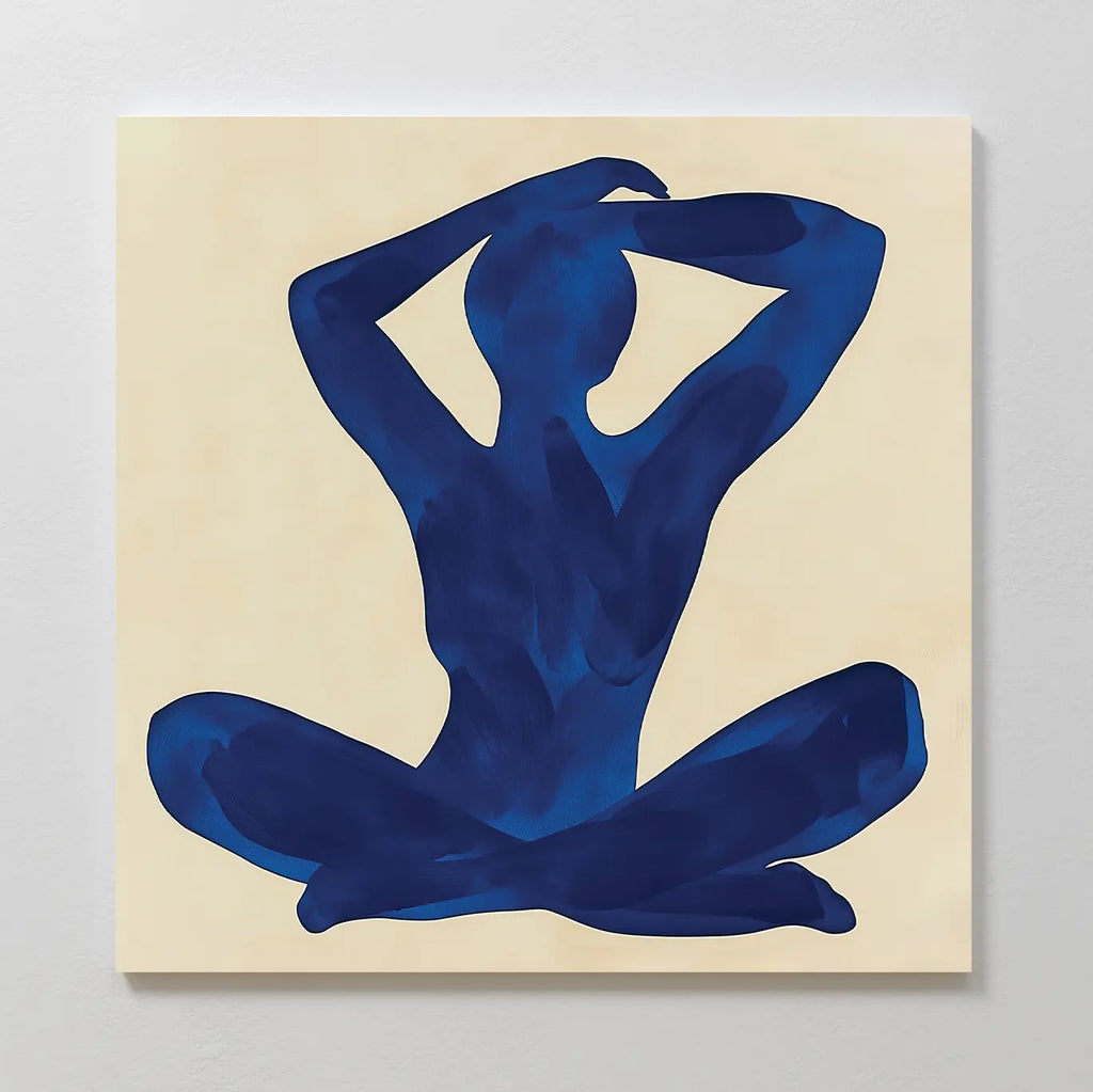 Cobalt Figure Canvas Art: A minimalist canvas print of a seated human figure in deep blue on a light beige background, with crossed legs and arms behind the head—no facial features. Modern abstract wall art for stylish spaces.