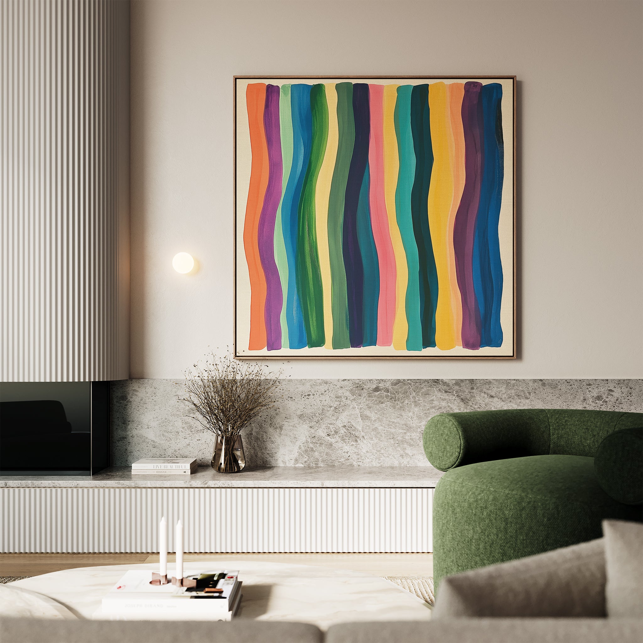 A modern living room with stylish decor, featuring a green upholstered chair, a low cabinet with dried flowers, and the Color Flow Canvas Art—abstract wall art of colorful vertical wavy stripes—displayed above a marble surface.