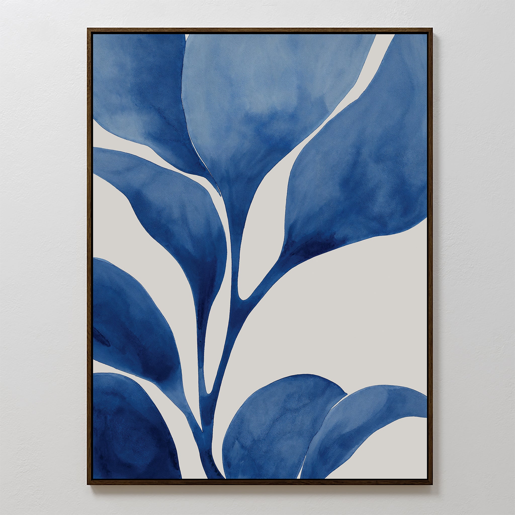 Cool Tangle Canvas Art is a framed piece featuring bold, abstract blue leaves with a watercolor effect on a white background—perfect minimalist wall art for an abstract botanical touch.
