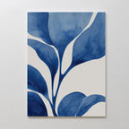 Cool Tangle Canvas Art showcases large, abstract blue leaves with white space on a light background, creating a modern and serene botanical look perfect for minimalist wall decor.