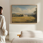 A woman admires the Countryside Dream Canvas Art displayed on a wall.