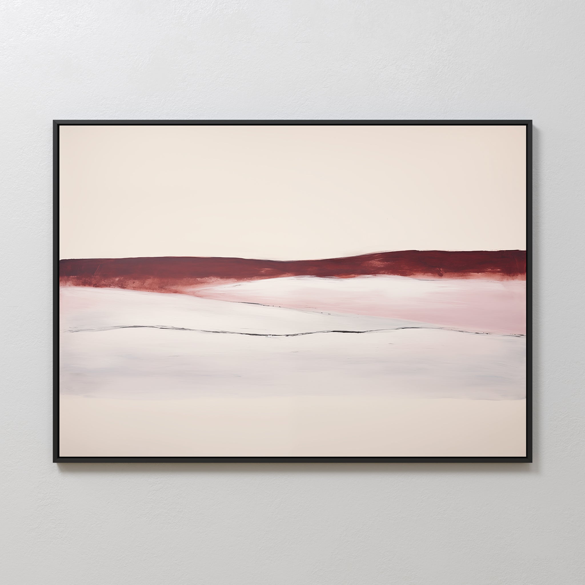 Crimson Horizon Abstract Canvas Art showcases a horizontal band of deep red over soft pink and white tones, framed in black—ideal modern wall art for living room decor on a light-colored wall.