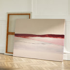 Two large canvases lean against a white wall; one reveals its blank back, while the other features the Crimson Horizon Abstract Canvas Art with red and pink horizontal brushstrokes on a neutral background—ideal for modern decor.