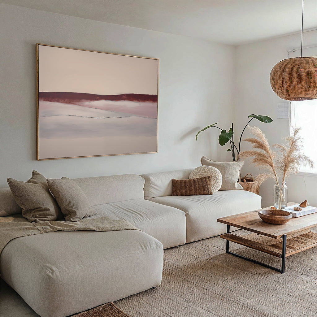 Neutral-toned living room with a beige sectional sofa, woven accents, wooden coffee table, pampas grass in a vase, and Crimson Horizon Abstract Canvas Art above the sofa, all bathed in soft natural light for stylish decor.