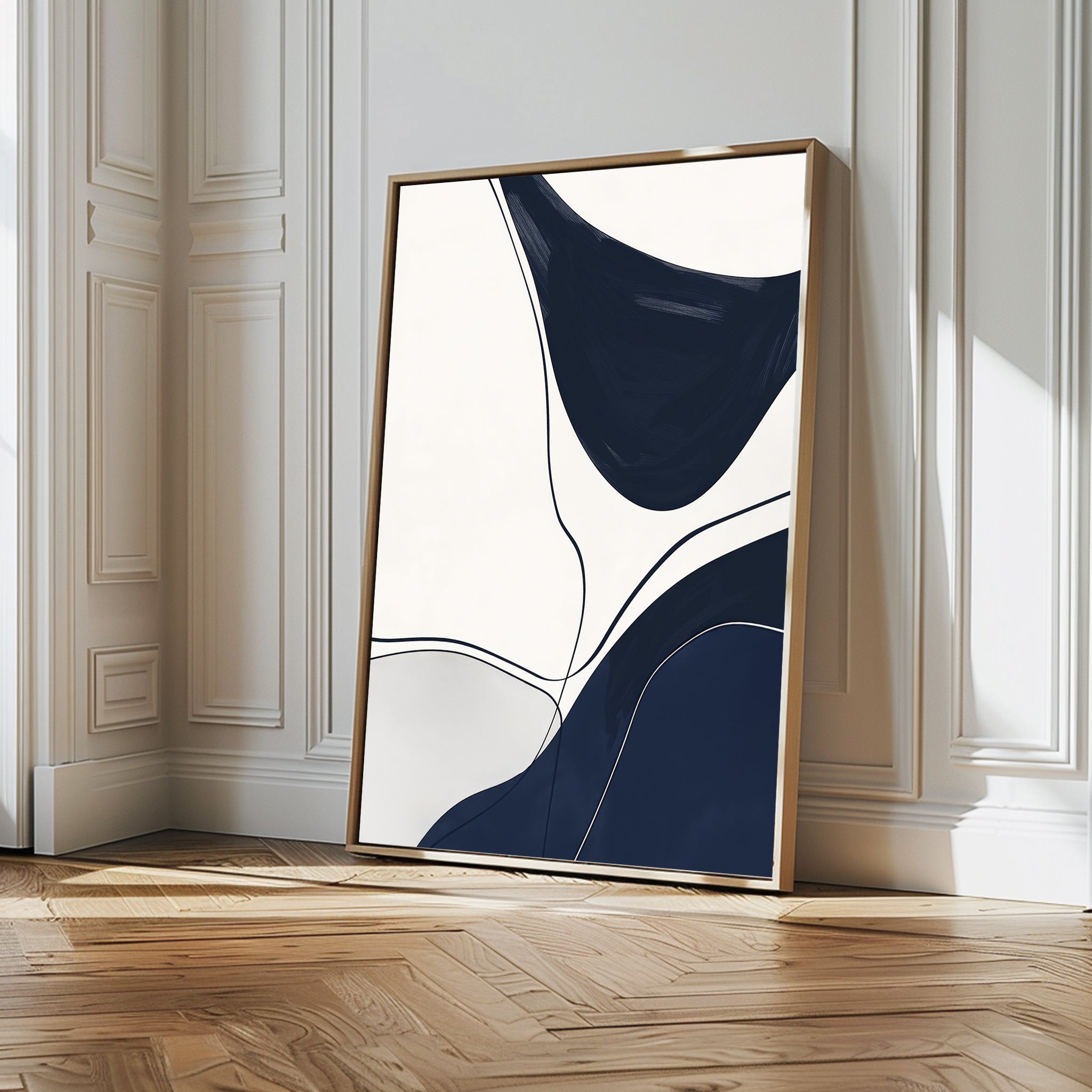The Curved Lines Abstract Canvas Art features bold navy shapes and fine black lines on a white backdrop, framed and leaning against a classic white wall—a perfect modern accent to enhance your living room decor.