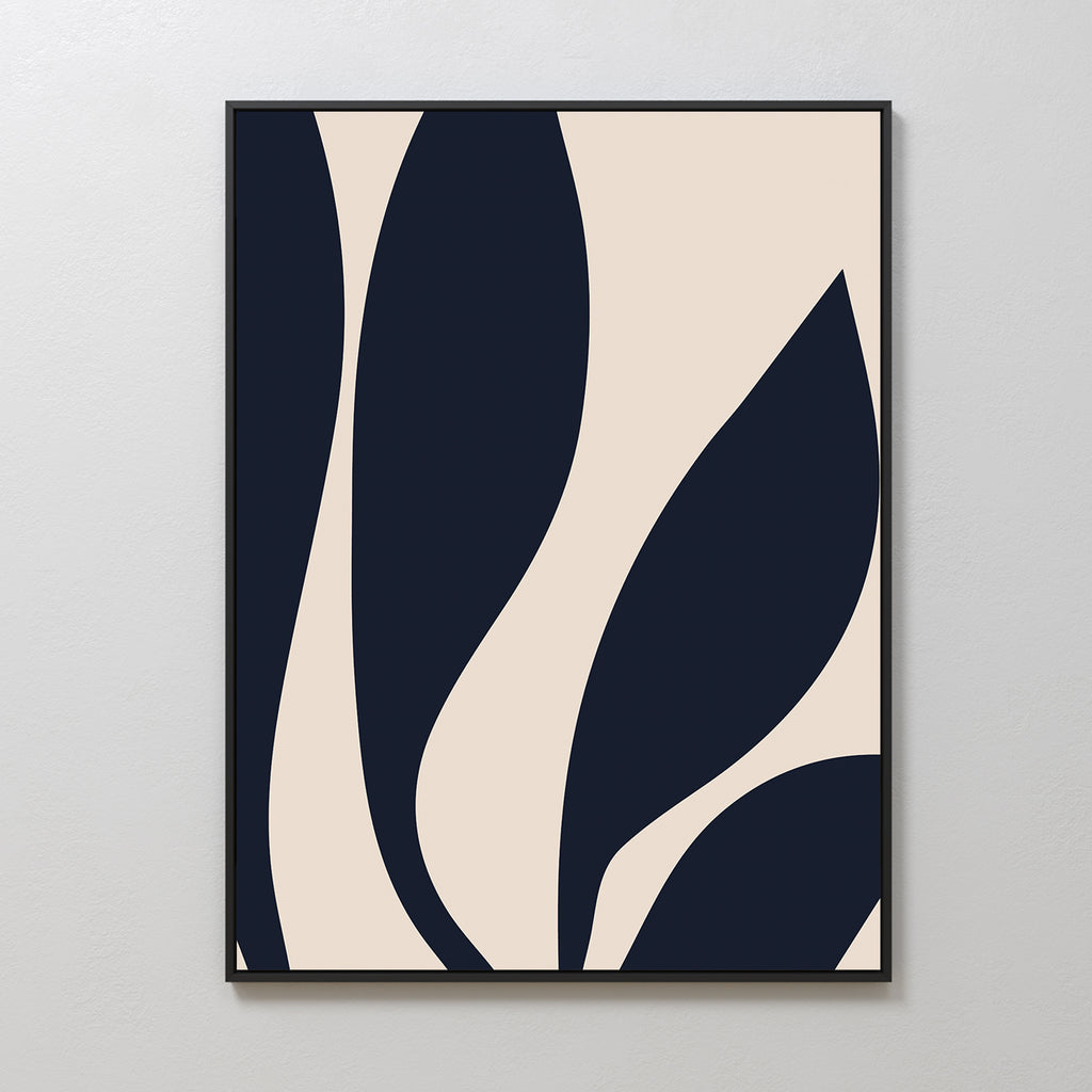 The Dark Blue Leaves Abstract Canvas Art showcases minimalist navy leaf shapes on a light beige background, framed in thin black and displayed on a white wall—perfect for adding modern elegance to your space.
